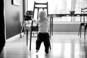 Documentary family photography kelowna, putting chair away