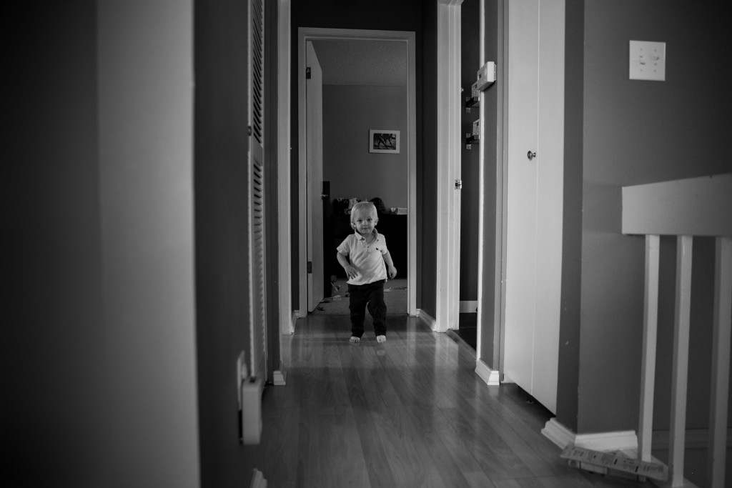 Documentary family photography kelowna, in the hallway