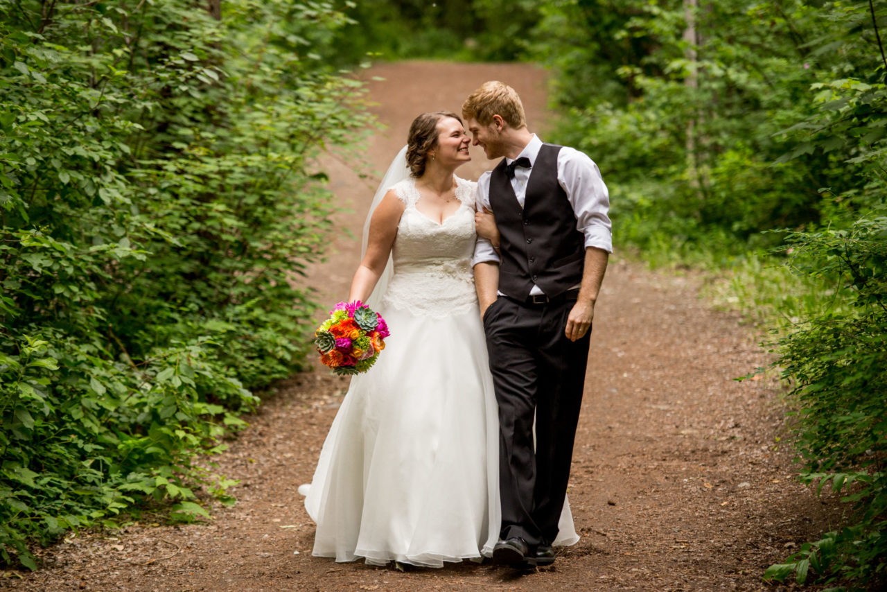 Nanaimo & Vancouver Island Wedding Photographer | Wedding Couple walking through forest