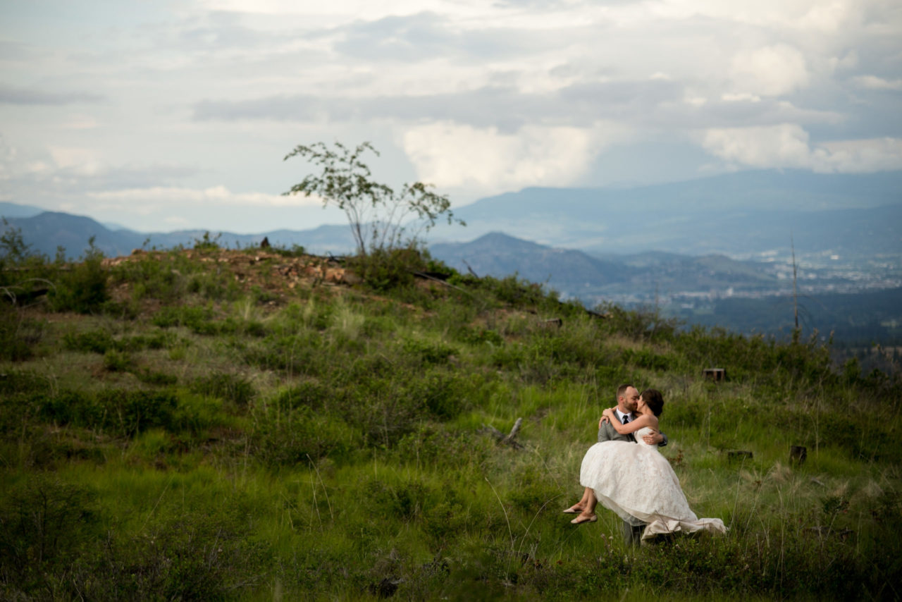 Nanaimo & Vancouver Island Wedding Photographer | Couple on mountain in long grass